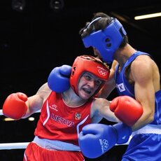 Evaldas Petrauskas (raudona apranga) ir Soon-Chulas Hanis | Fotodiena/Roberto Dačkaus nuotr. | Organizatorių nuotr. 58