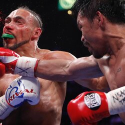 Manny Pacquiao ir Keitho Thurmano kovos akimirka | Scanpix nuotr. 1