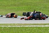 „MotoGP“: J.Milleris patyrė šiurpią avariją, F.Bagnaios pergalė išlaikė intrigą čempionate, o potvynis Valensijoje sujaukė organizatorių planus