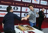 Drama pasaulio čempionate: figūrą pametęs ir ėjimo atlikti nespėjęs Carlsenas vis tiek iškovojo auksą
