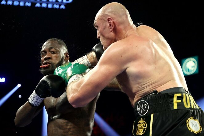 Deontay Wilderis ir Tysonas Fury | Scanpix nuotr.