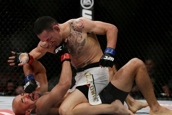Jose Aldo ir Maxo Holloway dvikova | Scanpix nuotr.