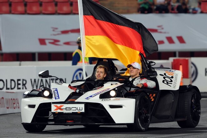 Sebastianas Vettelis ir Michaelis Schumacheris | AFP/Scanpix nuotr.