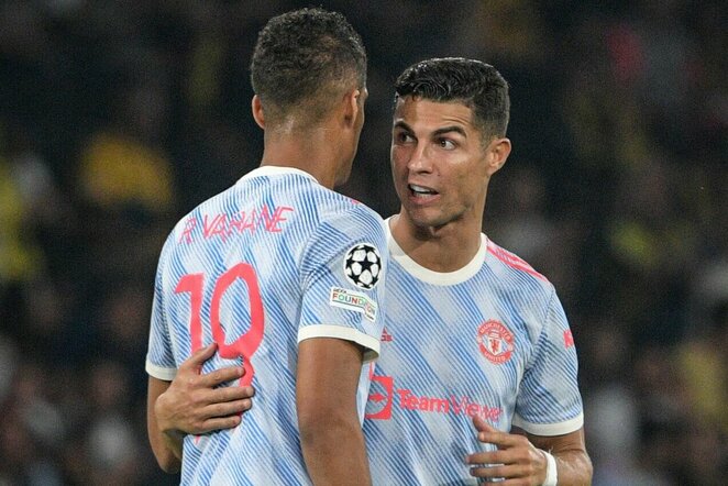 Raphaelis Varane ir Cristiano Ronaldo | Scanpix nuotr.