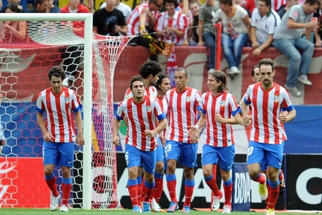 Madrido „Atletico“ žaidėjai po įvarčio į „Valladolid“ vartus | AFP/Scanpix nuotr.