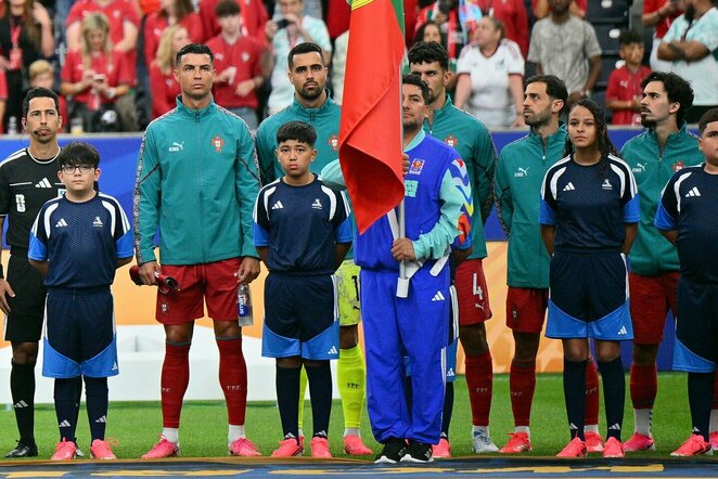 Cristiano Ronaldo su komandos draugais | EPA nuotr.