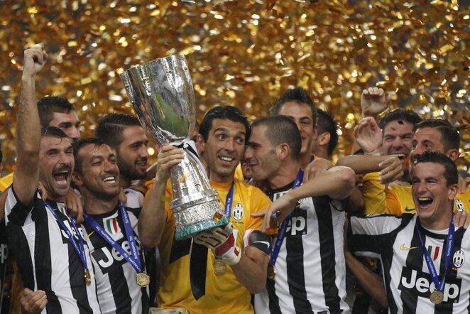 Triumfuojantys Turino „Juventus“ komandos futbolininkai | AP/Scanpix nuotr.