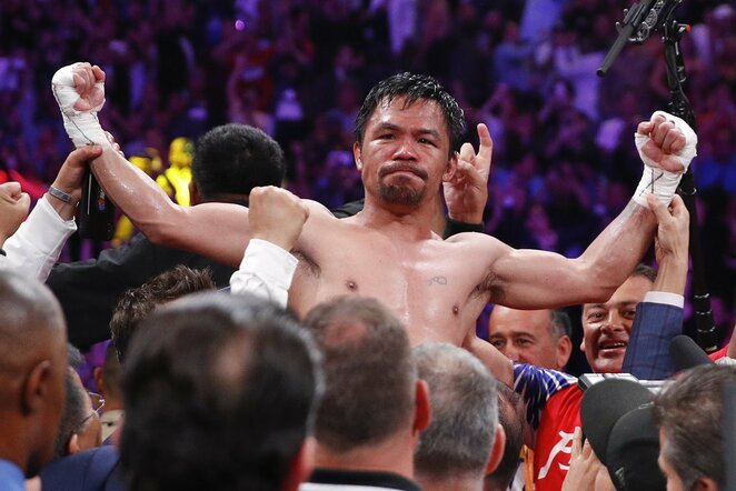 Manny Pacquiao ir Keitho Thurmano kovos akimirka | Scanpix nuotr.