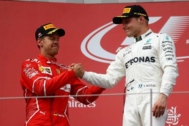 Valtteri Bottas ir Sebastianas Vettelis | Scanpix nuotr.