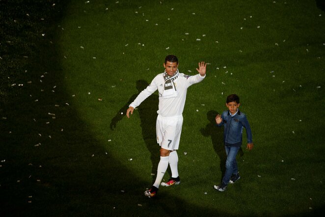 Cristiano Ronaldo su sūnumi | Scanpix nuotr.