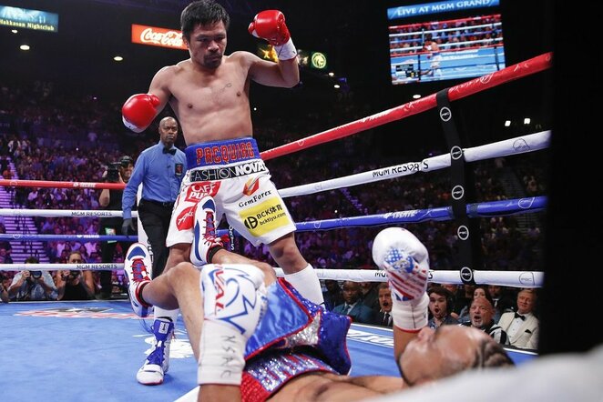 Manny Pacquiao ir Keitho Thurmano kovos akimirka | Scanpix nuotr.